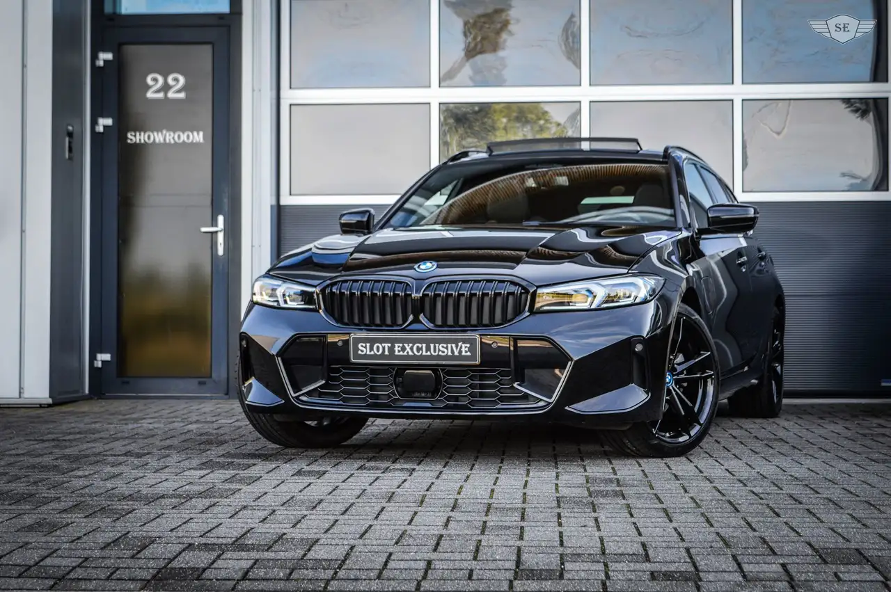 BMW 330 3-serie Touring 330e|PANO|ACC|TREKHAAK|MEMORY|LED| — photo 1 of 40