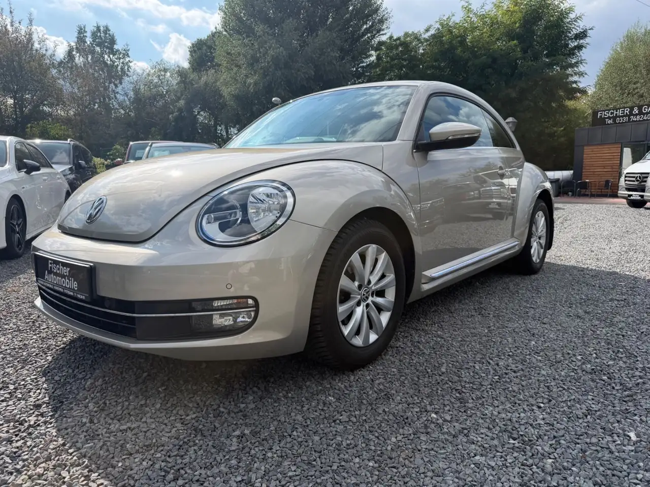Volkswagen Beetle Lim. Design+KLIMATRONIK+PDC+SITZ.H+ — photo 1 of 14