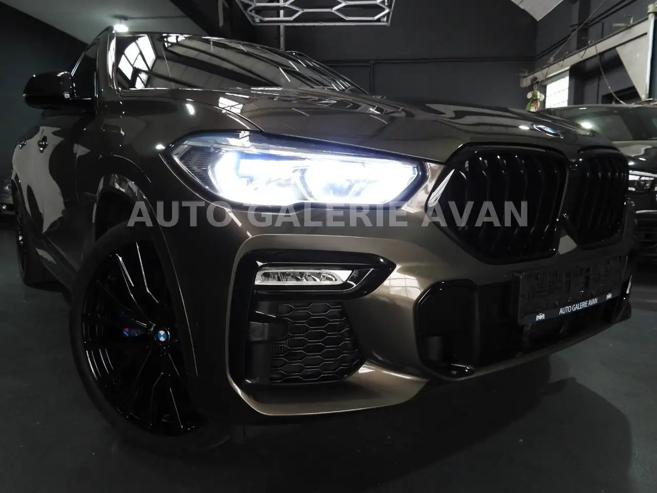 BMW X6 M50i — photo 1 of 31