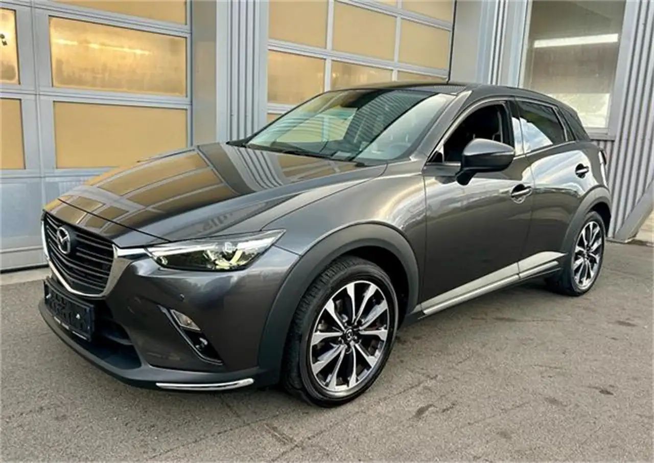 Mazda CX-3 G121 Revolution Top mit Navigation & Carplay/ — photo 1 of 13
