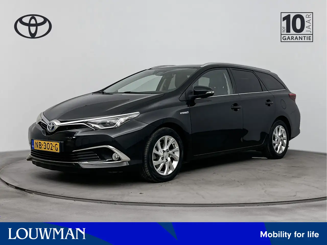 Toyota Auris Touring Sports 1.8 Hybrid Lease pro | Navigatie | — photo 1 of 33
