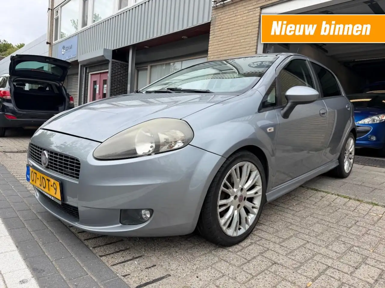 Fiat Punto 1.4-16V Sport CLIMA 17 INCH PDC NAP APK 4-2027 RIJ — photo 1 of 23