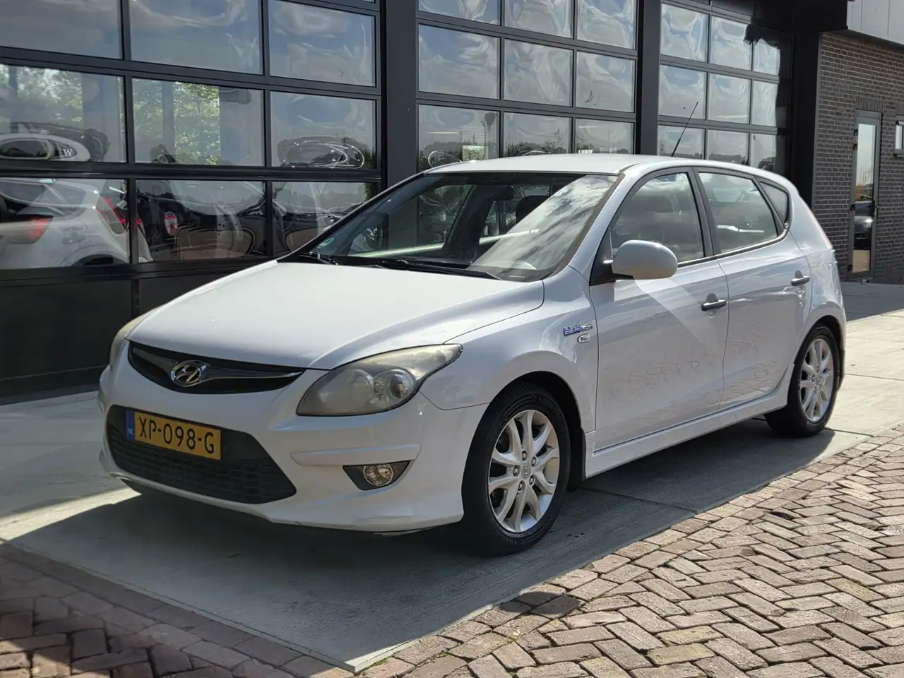 Hyundai i30 1.4i i-Drive | Airco | Stoelverwarming — photo 1 of 19