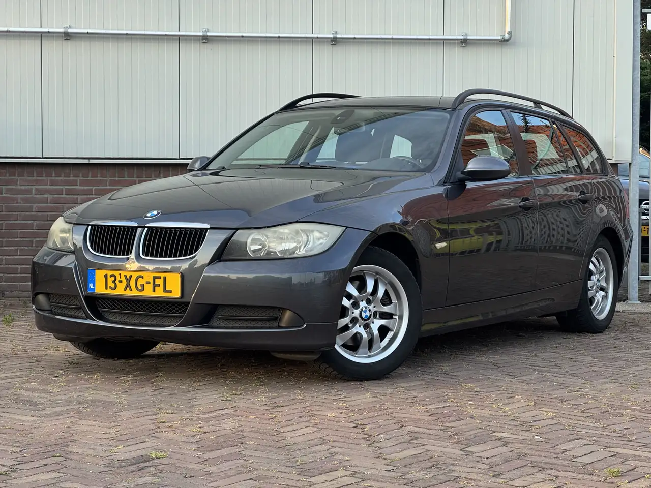 BMW 318 3-serie Touring 318i High Executive AUTOMAAT (LEES — photo 1 of 14