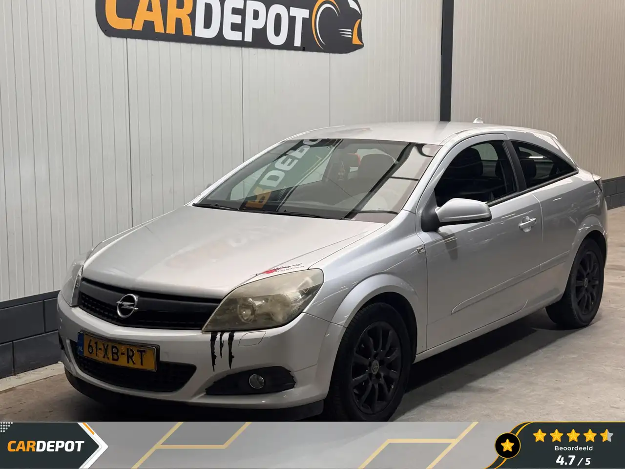 Opel Astra GTC 1.6 Temptation — photo 1 of 25