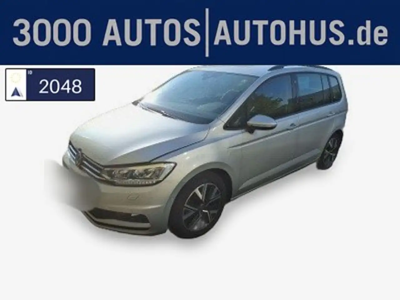 Volkswagen Touran — photo 1 of 16