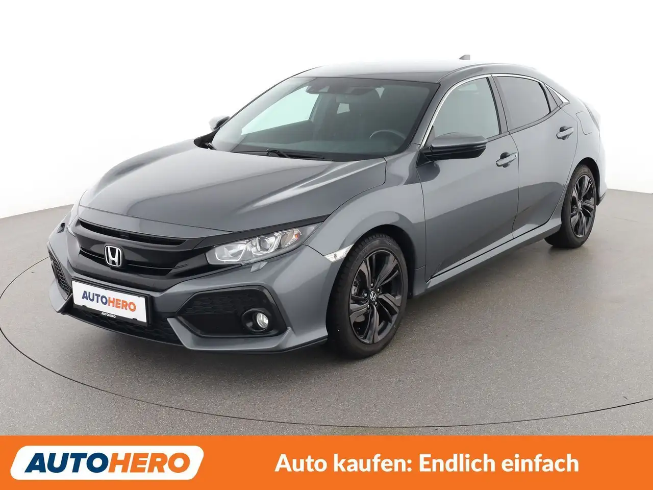 Honda Civic 1.0 VTEC Elegance — photo 1 of 28