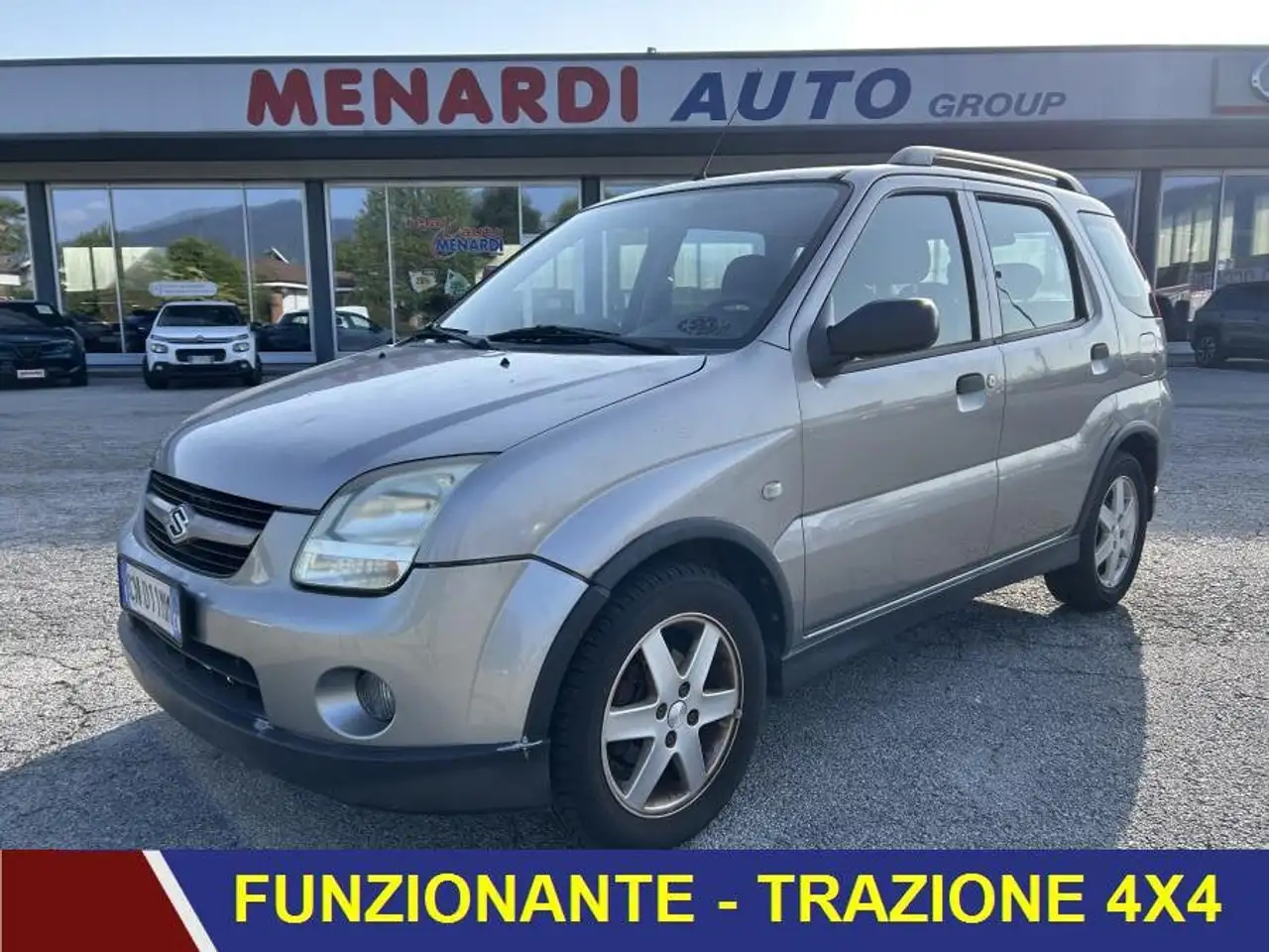 Suzuki Ignis 1.5 GPL 4WD Deluxe — photo 1 of 13