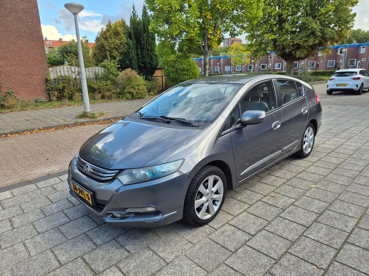 Honda Insight 1.3 Elegance — photo 1 of 26