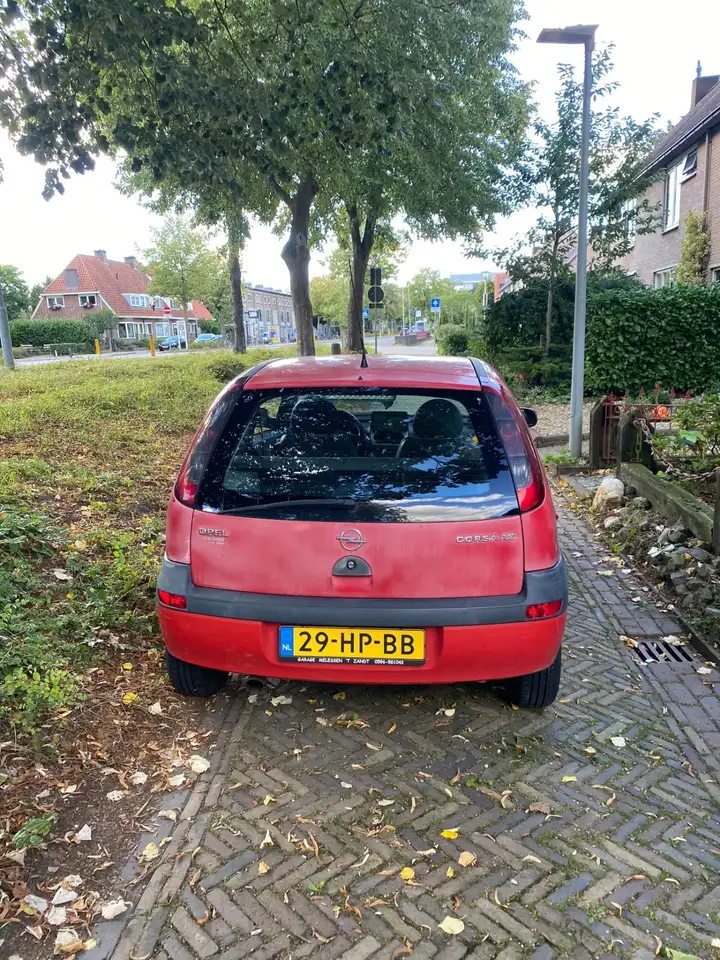 Opel Corsa 1.2-16V Comfort — photo 1 of 9