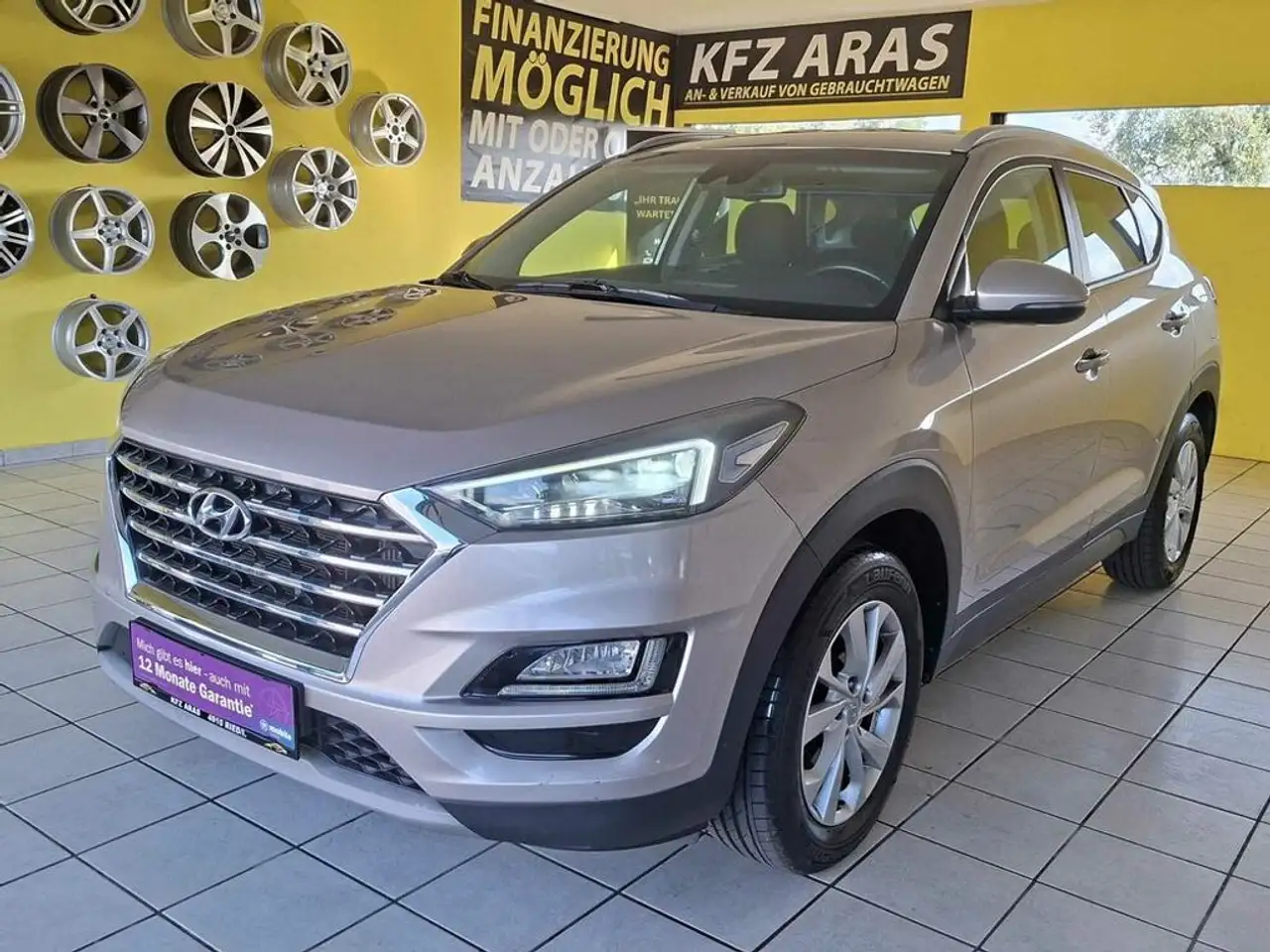 Hyundai TUCSON 2,0 CRDI 4WD Aut. RFK, PDC, AHK, TEMP. — photo 1 of 27