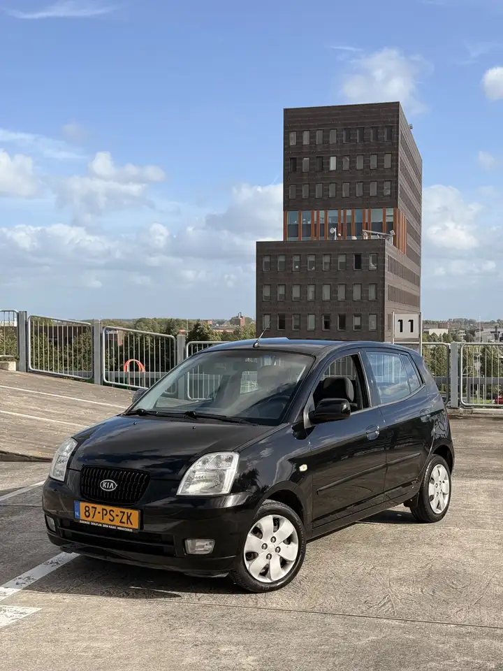 Kia Picanto 1.0 EX — photo 1 of 20