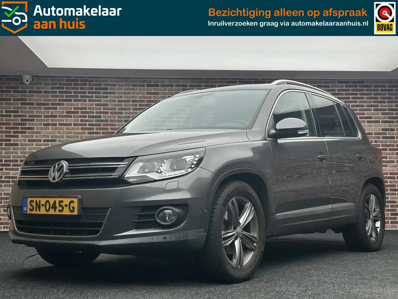 Volkswagen Tiguan 1.4 TSI Pano| elektrische stoelen — photo 1 of 38