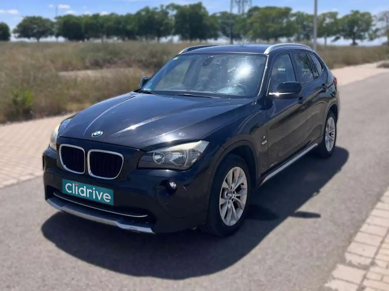 BMW X1 xDrive18d — photo 1 of 14