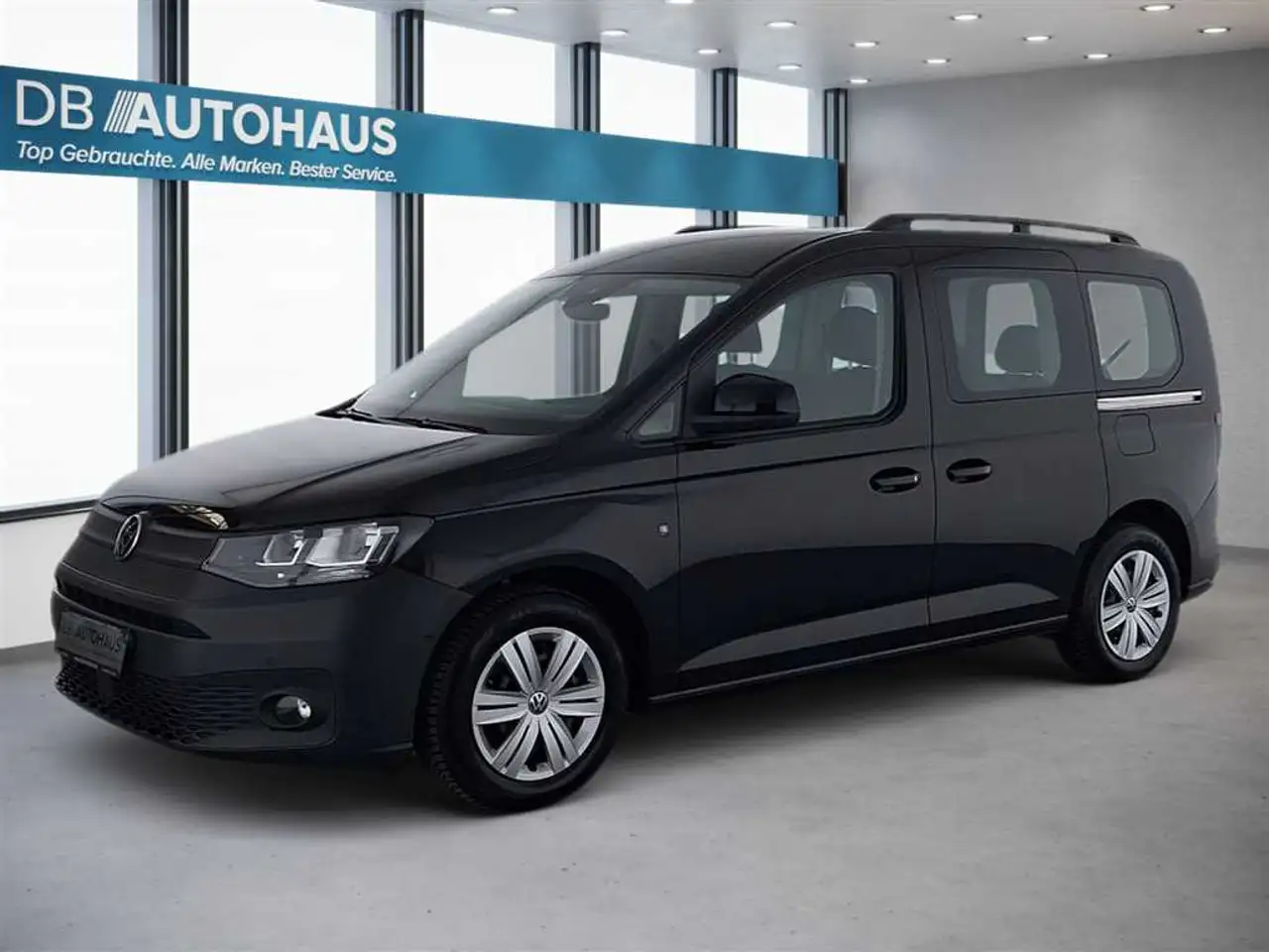 Volkswagen Caddy 2.0 TDI — photo 1 of 33