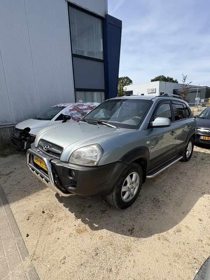 Hyundai TUCSON 2.0i Dynamic — photo 1 of 6