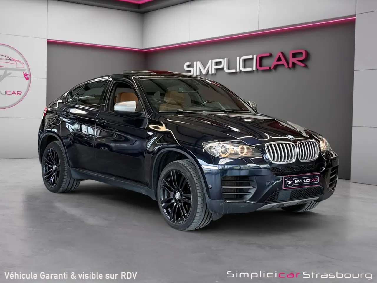 BMW X6 M50D — photo 1 of 15