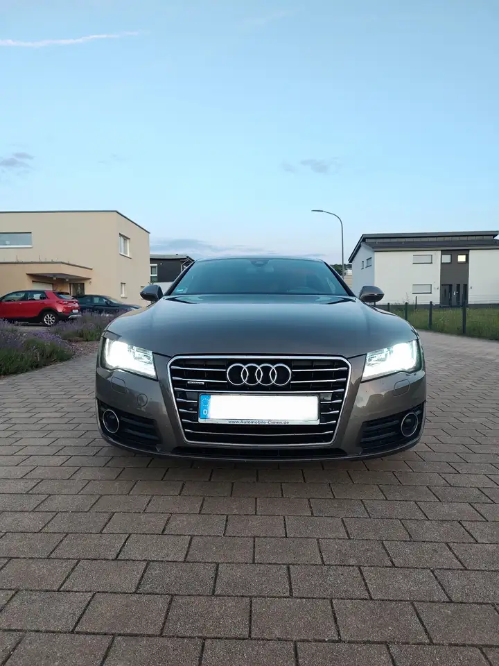 Audi A7 3.0 TDI quattro tiptronic — photo 1 of 13