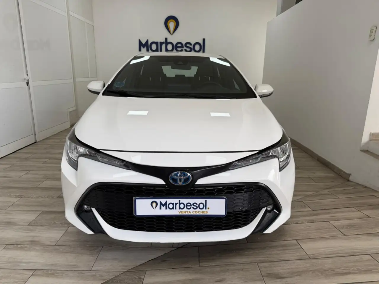 Toyota Corolla 125H Business — photo 1 of 25
