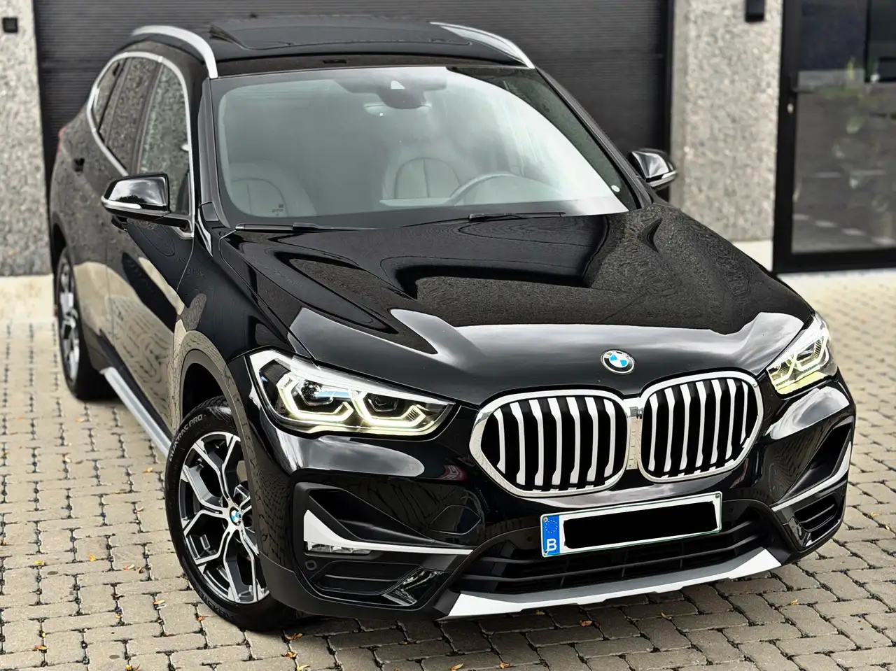BMW X1 Benzine/Automaat/Pano/1e eigenaar/1J garantie — photo 1 of 15