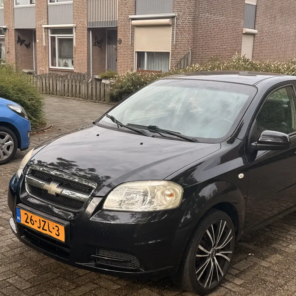 Chevrolet Aveo 1.4-16V Style — photo 1 of 13