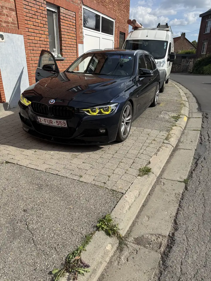 BMW 318 Touring dA — photo 1 of 15