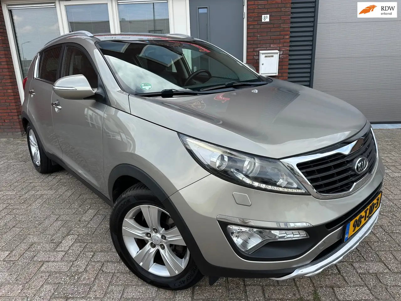 Kia Sportage 1.6 GDI ISG X-clusive / Leder / Camera / Navi / PD — photo 1 of 32