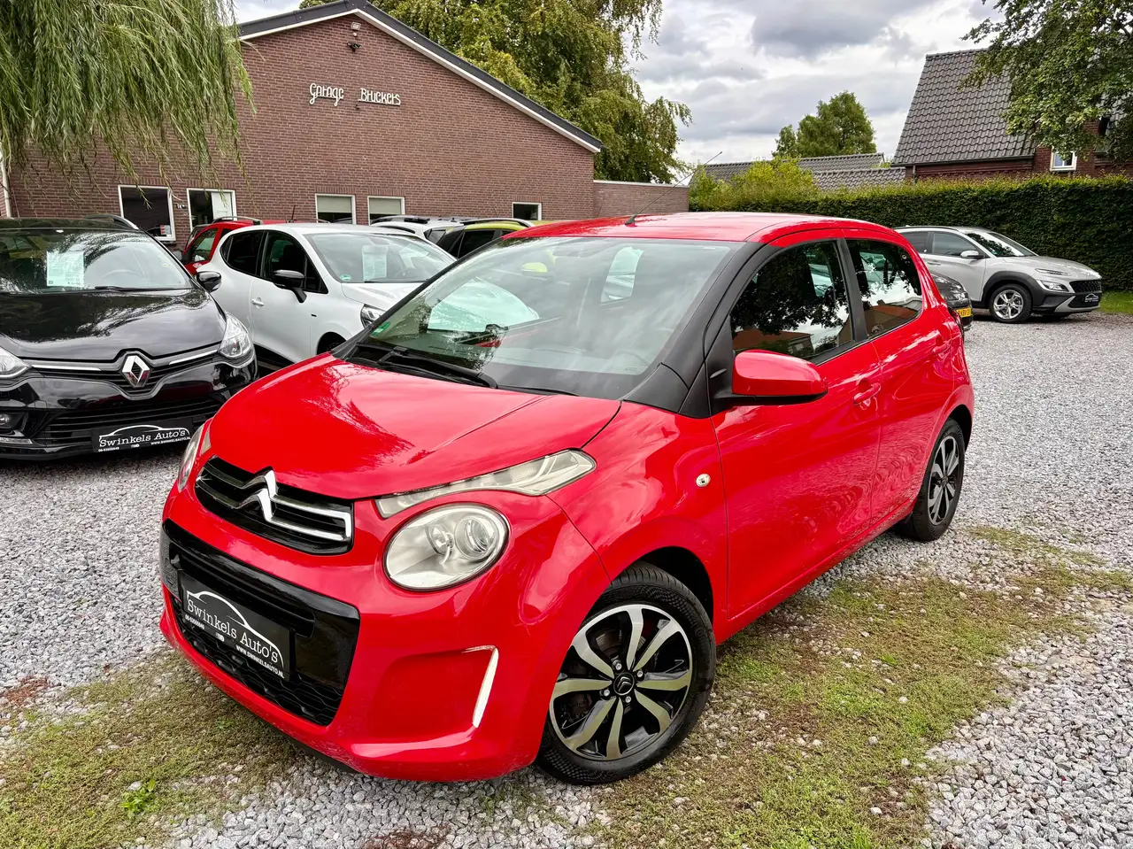 Citroen C1 1.2 PureTech Shine (Hatchback 5-dr.)-82 pk-8x Licht metalen velgen zomer/winter-LED-Navi via telefoon-airco-el. ramen — photo 1 of 40