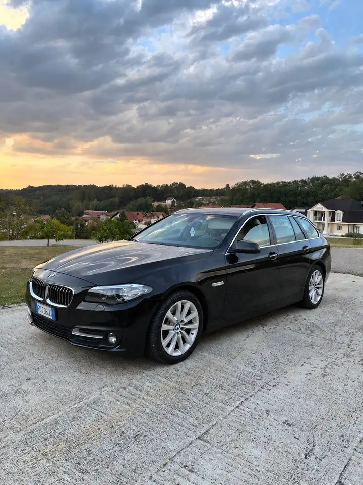 BMW 520 Luxury — photo 1 of 15
