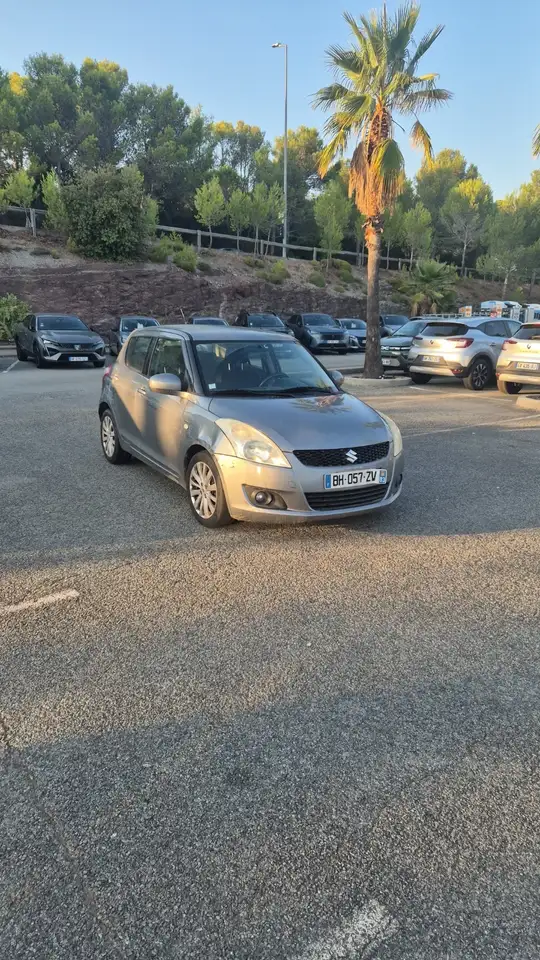 Suzuki Swift 1.3 DDiS So' Color — photo 1 of 6