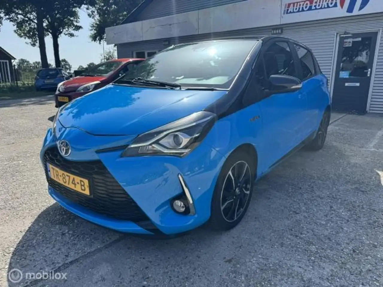 Toyota Yaris 1.5 Hybrid SkyBlue Bi-Tone NL-Auto+1e.EIG. — photo 1 of 22
