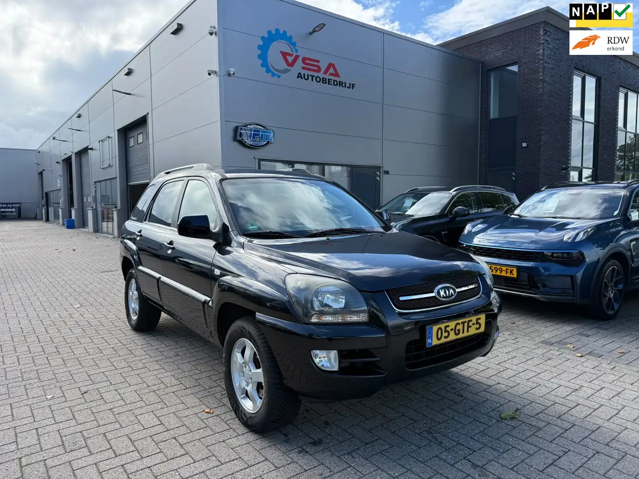 Kia Sportage 2.0 CVVT X-tra|NAP|Leder|Climate|Cruise|4-seizoen — photo 1 of 6