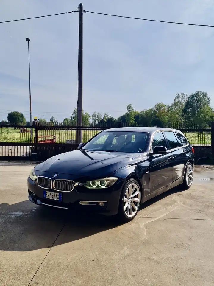 BMW 318 318d Touring Modern Automatica — photo 1 of 14