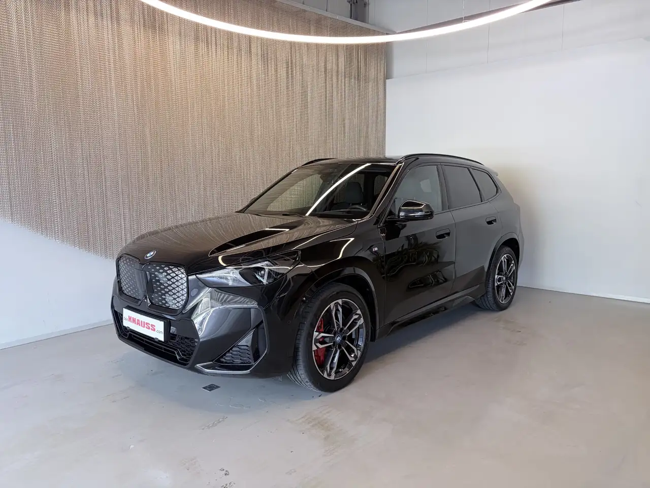 BMW iX1 eDrive20 — photo 1 of 19