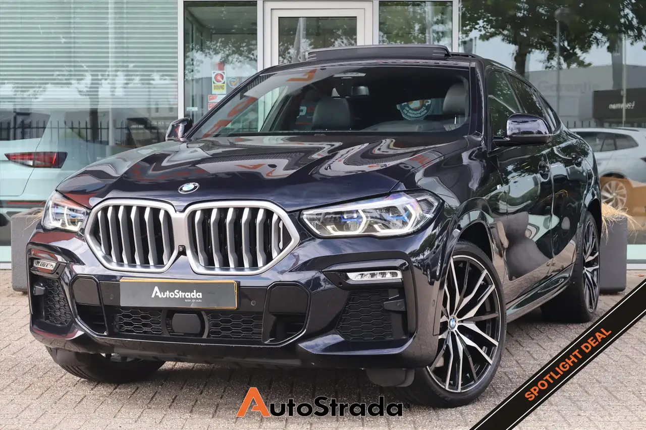 BMW X6 (g06) xDrive40i M-SPORT 340pk | NL AUTO | 1e EIG | — photo 1 of 40