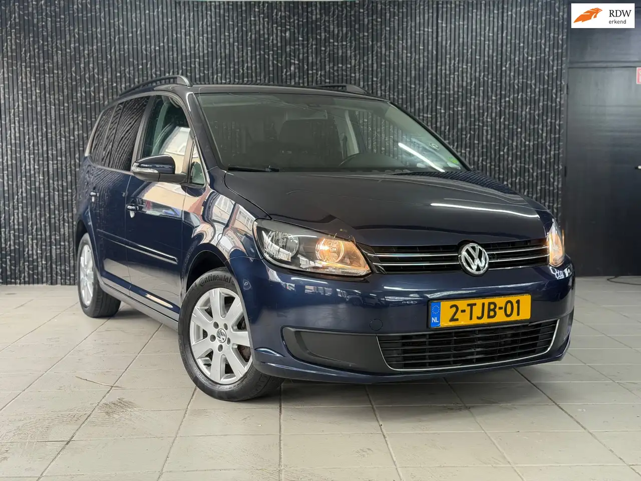 Volkswagen Touran 1.4 TSI Comfortline 7p. Automaat | Airco | Navi | — photo 1 of 24