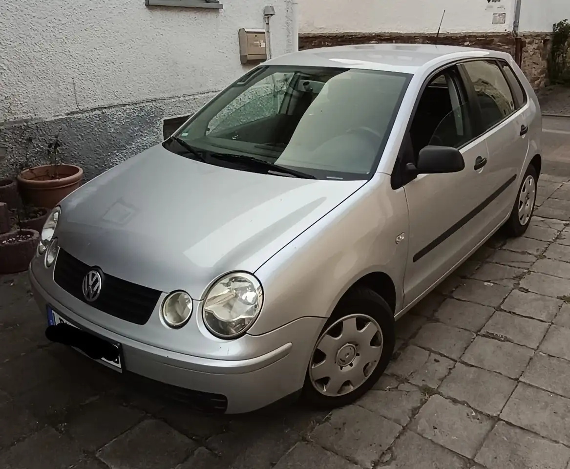 Volkswagen Polo 1.2 — photo 1 of 11