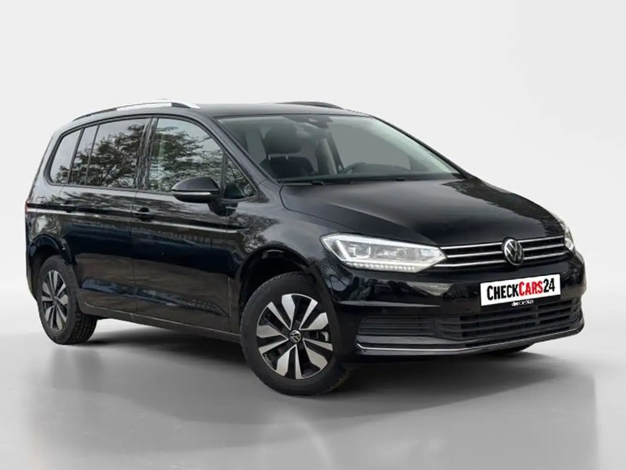 Volkswagen Touran Comfortline BMT/Start-Stopp — photo 1 of 14