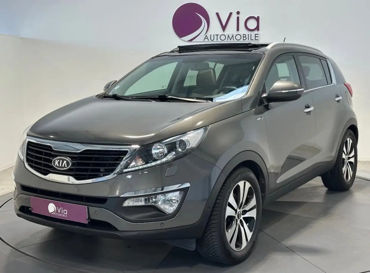 Kia Sportage 2.0 CRDI 135 PREMIUM 4X4 — photo 1 of 32