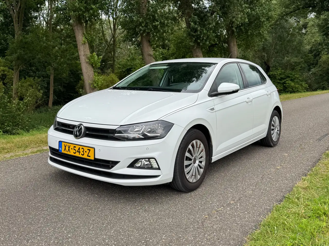Volkswagen Polo 1.0 TSI Comfortline 95pk 7-DSG 2019 Wit Digital Dash — photo 1 of 9