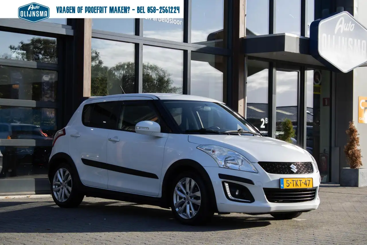 Suzuki Swift 1.2 Exclusive|GT-pakket|Stoelverwarming|Clima| — photo 1 of 34