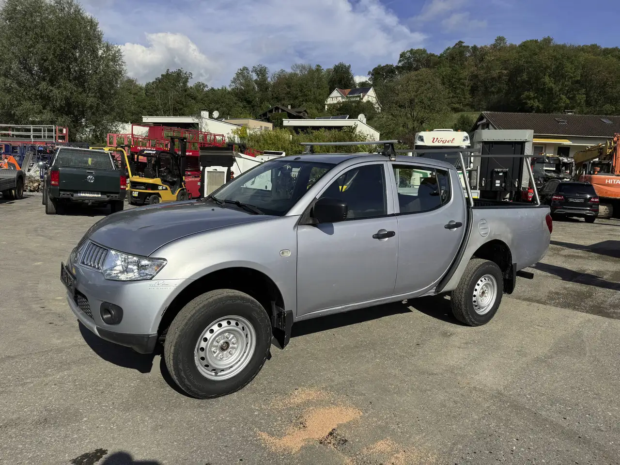 Mitsubishi L200 DK Di-D 2,5 Work Edition 4x4 Klima — photo 1 of 20