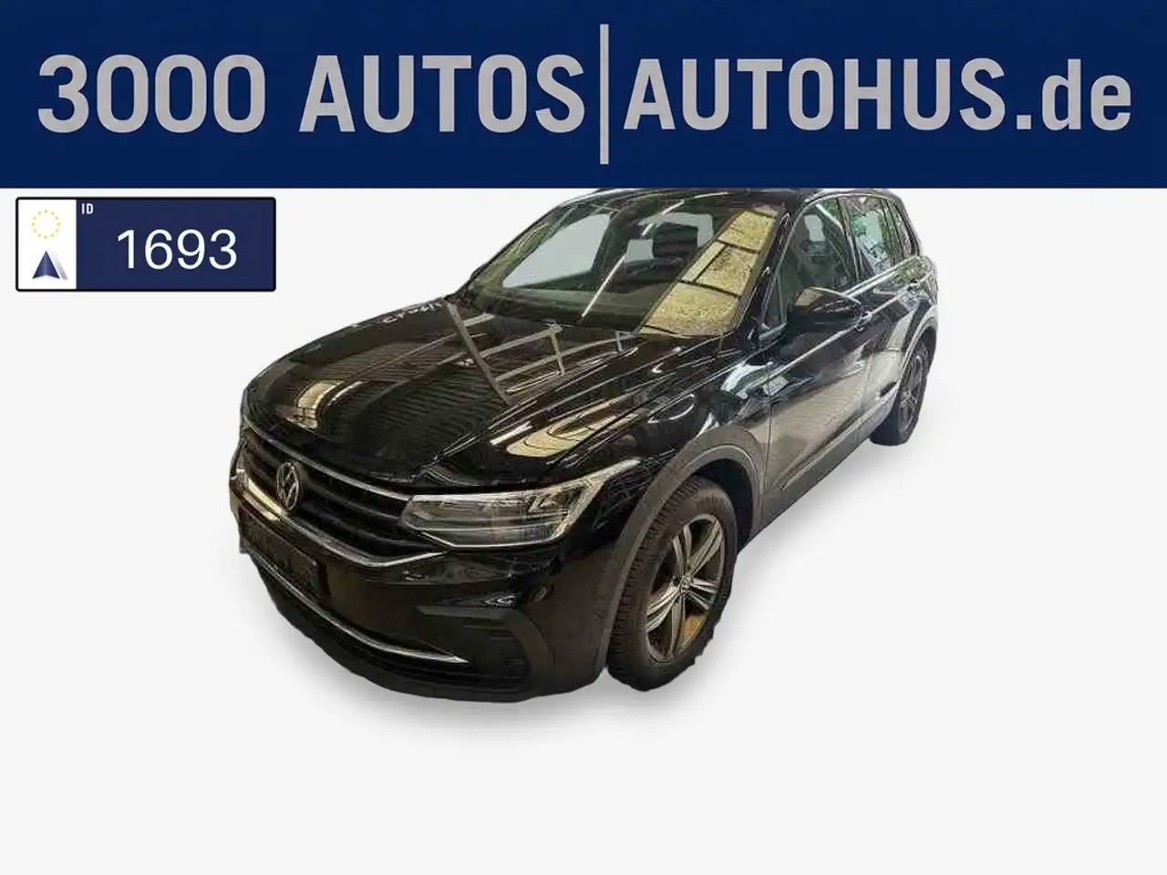 Volkswagen Tiguan — photo 1 of 16