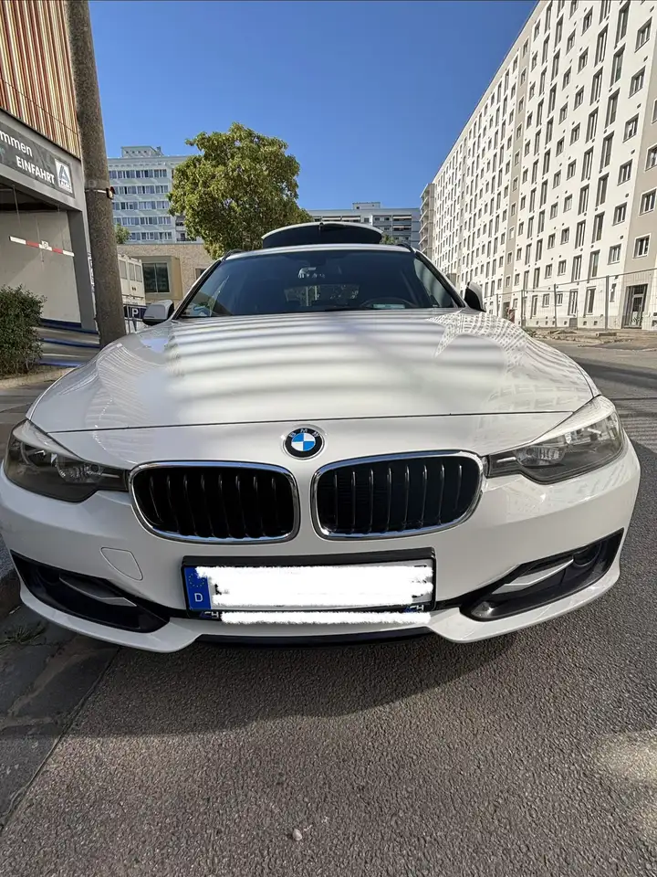BMW 318 318d Touring Sport Line — photo 1 of 15