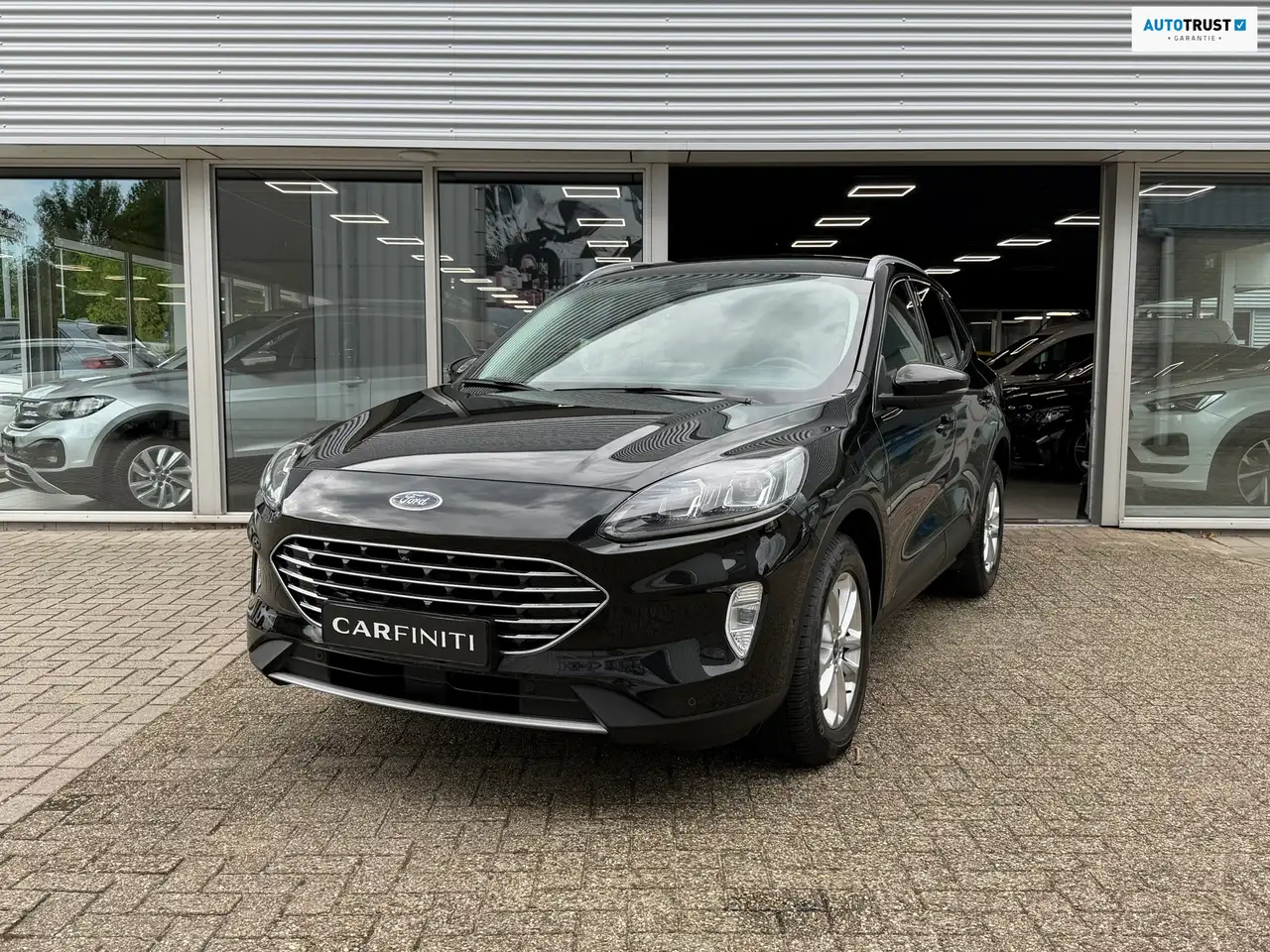 Ford Kuga 2.5 PHEV 225 Pk | Titanium | Navigatie |Cruise |Ca — photo 1 of 40