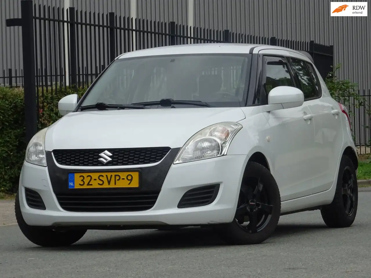 Suzuki Swift 1.2 Comfort EASSS 5DRS AIRCO/STOELVERW/APK — photo 1 of 20