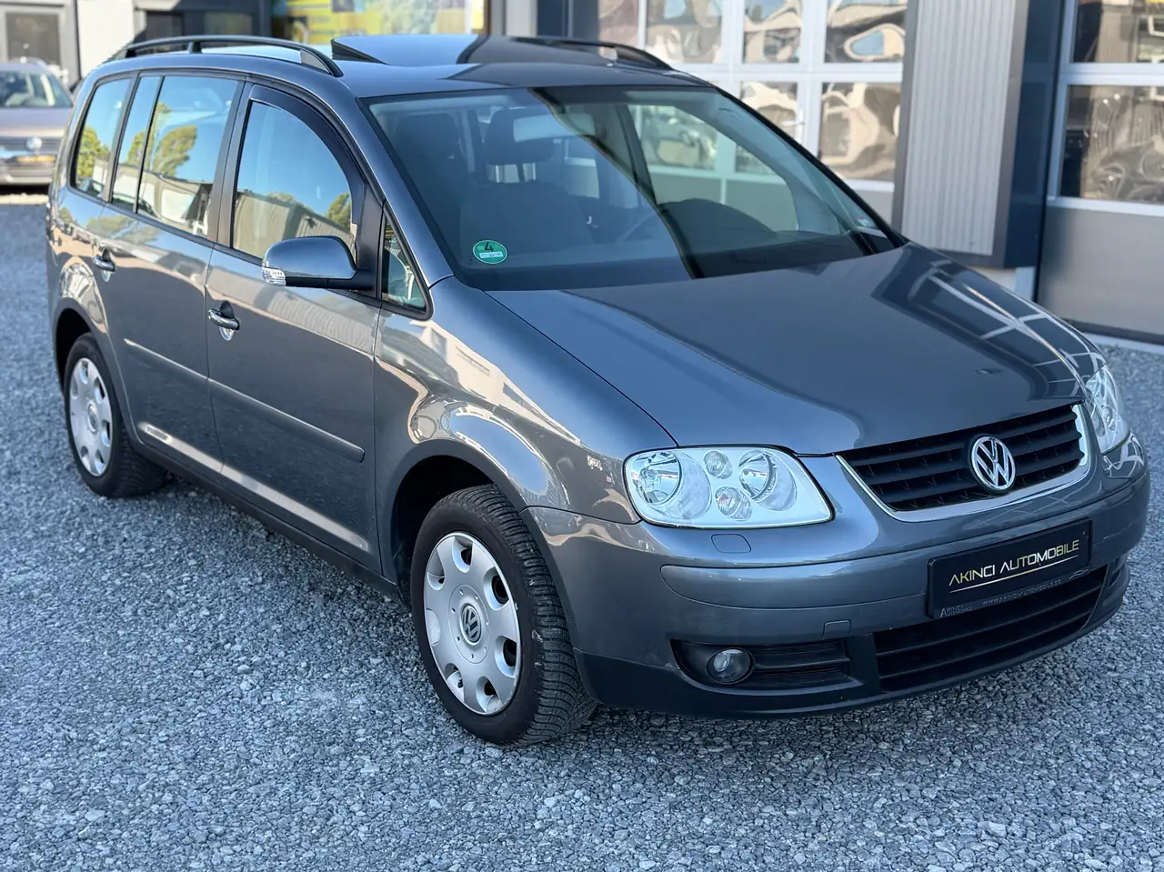 Volkswagen Touran 1.6 FSI | AUTOMATIK | PARKTRONIC | TÜV | ABS — photo 1 of 15