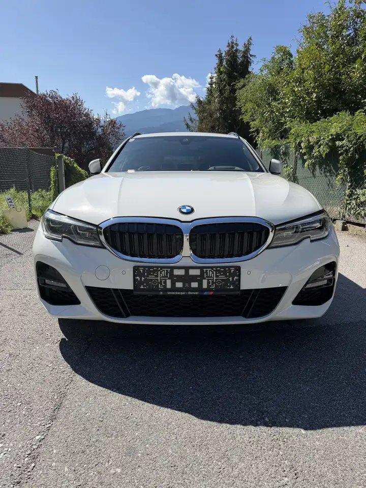 BMW 320 320e PHEV Touring Aut. — photo 1 of 12