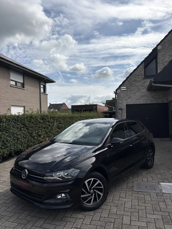 Volkswagen Polo 1.0 TSI DSG OPF Comfortline — photo 1 of 11