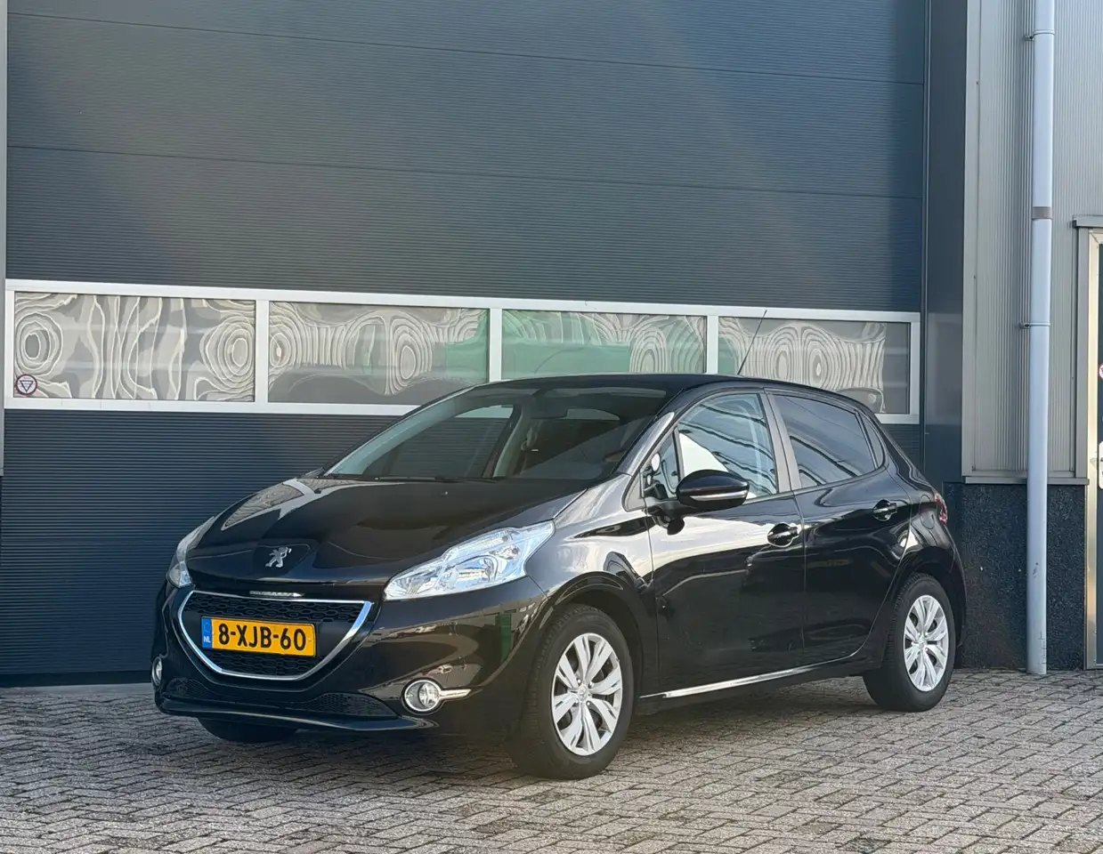 Peugeot 208 1.2 VTi Urban Soul bj.2013 Navi|Airco|Cc. — photo 1 of 25